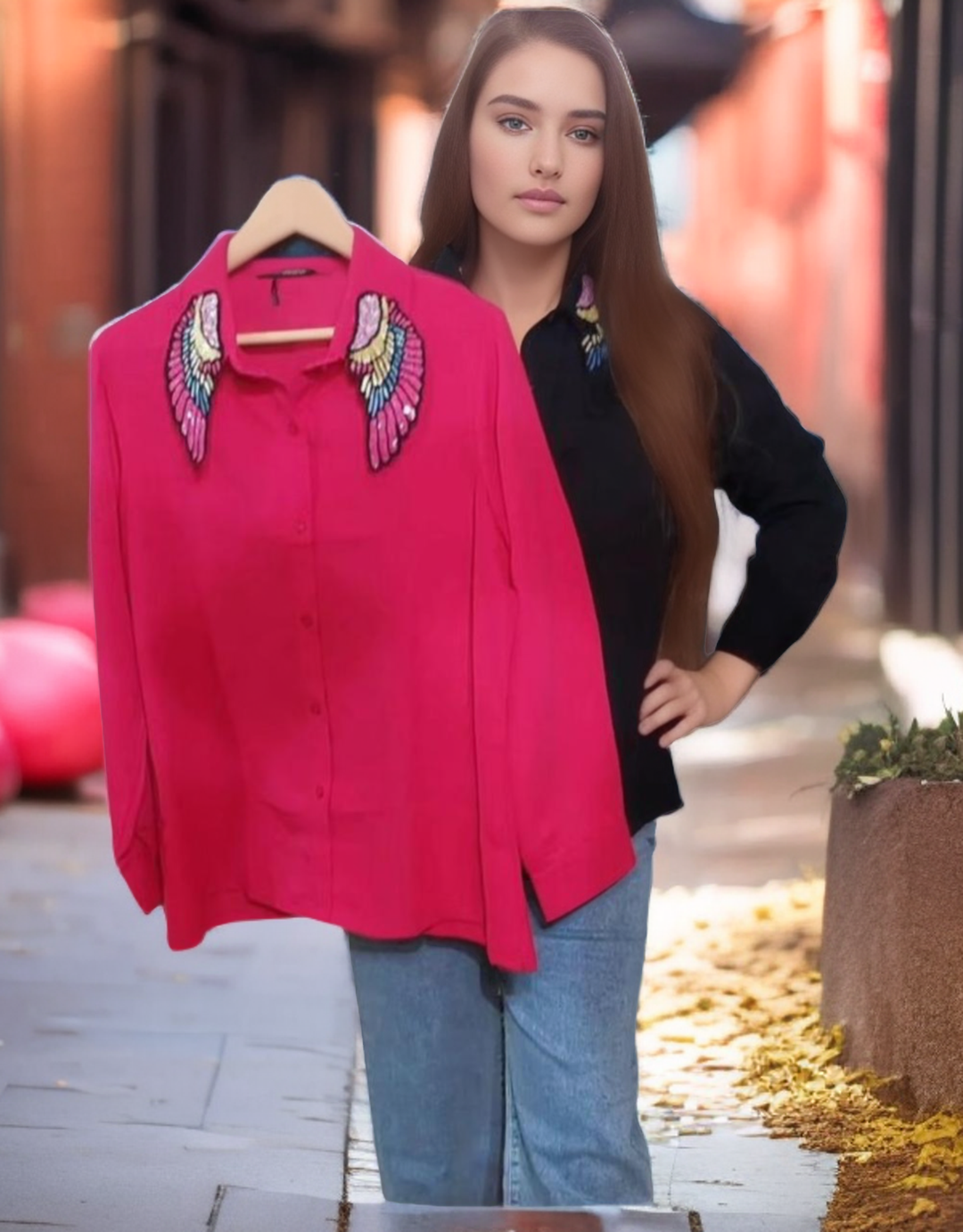 a woman standing next to a pink shirt